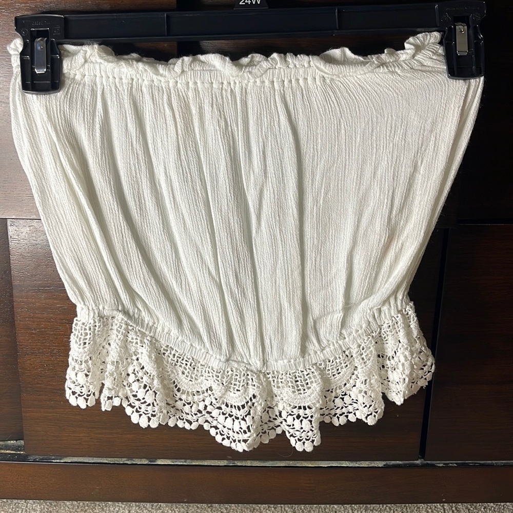 White crochet bottom crop top from Discovery Clothing Company
